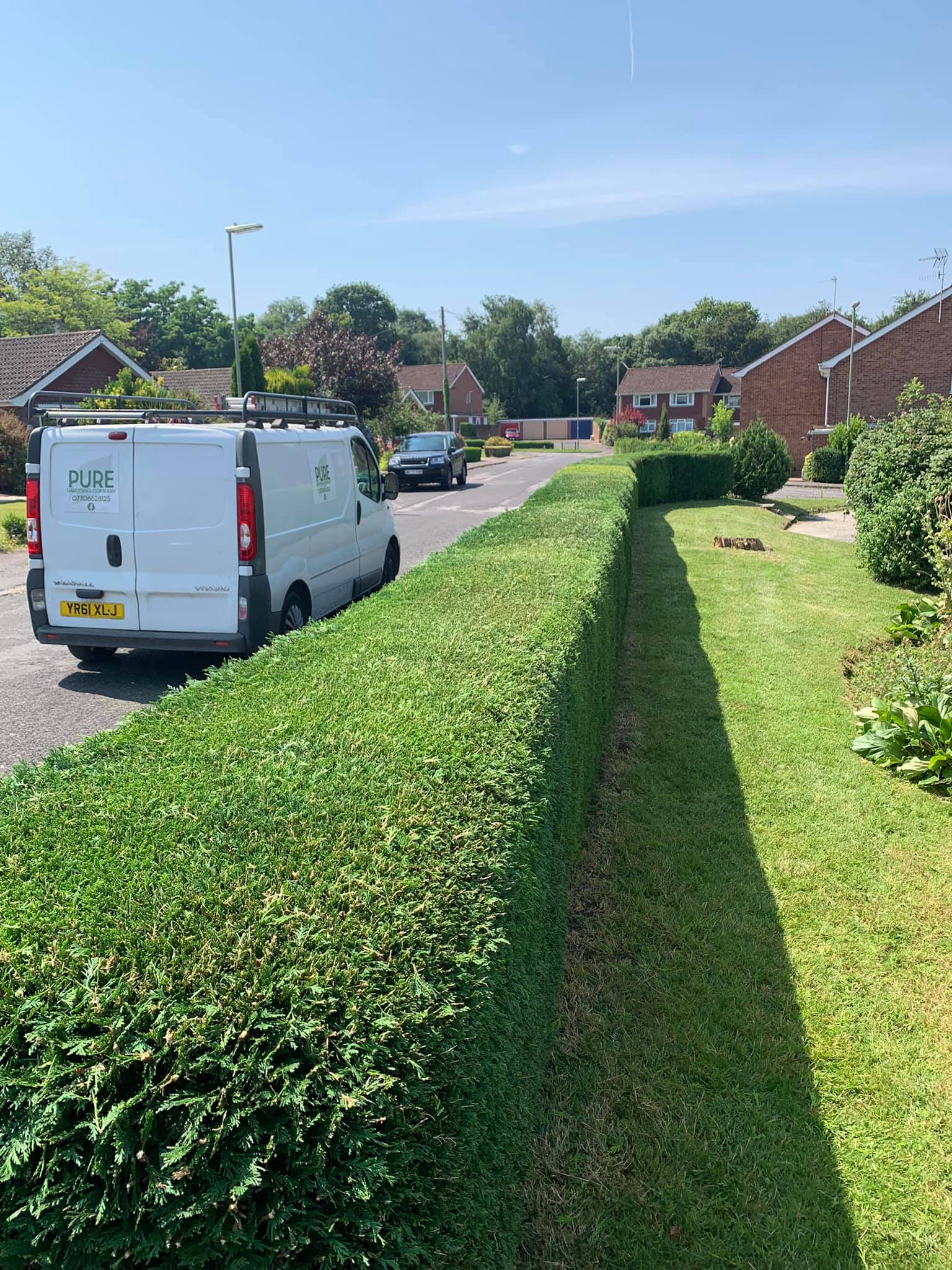 Pure Gardening Company branded van — professional local gardening team